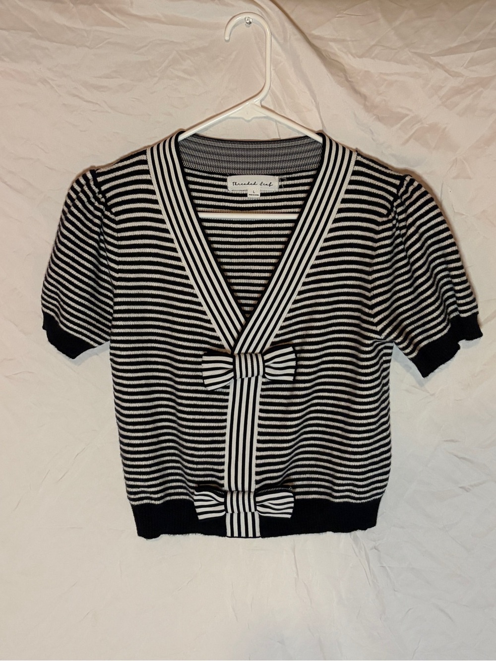 Threaded Leaf Black & White Striped V-Neck Sweater Top with Bow Accents